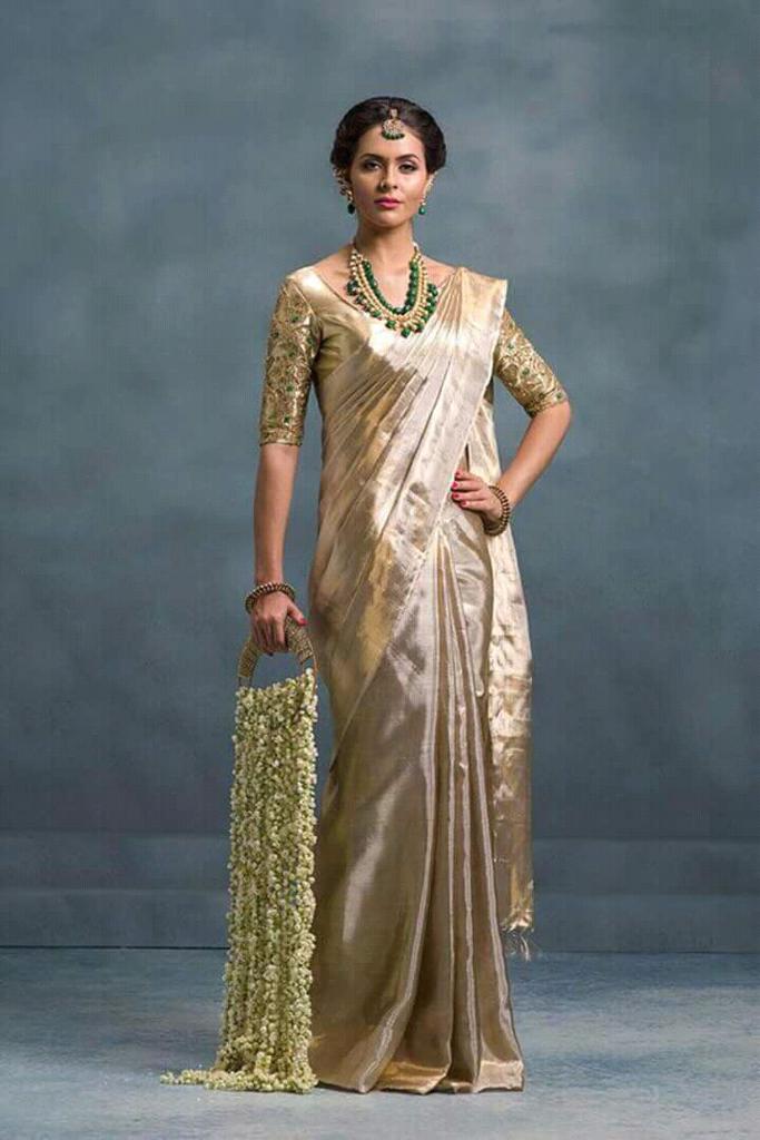 Uppada ethnic golden tissue sarees - Main Image