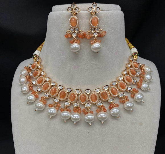 Vyshali , elegant Kundan Necklace Set With Peach shade  stones  for women -AKC001KND