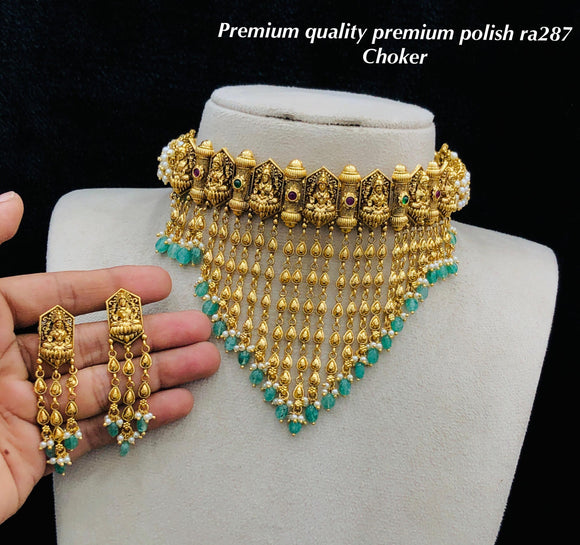 Ambika , elegant Matte Gold Finish Goddess Lakshmi Design Choker Necklace Set for women -SHAKI001LC
