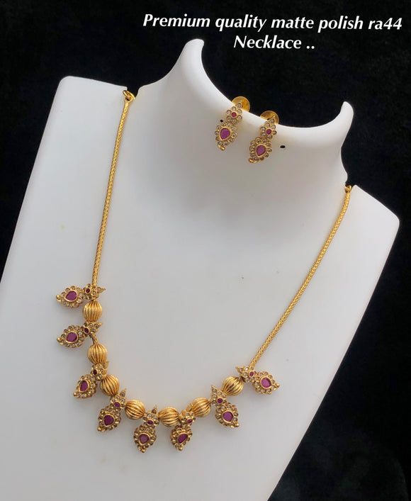 Sukanya . elegant matte gold finish Necklace Set for Women -SHAKI001MG