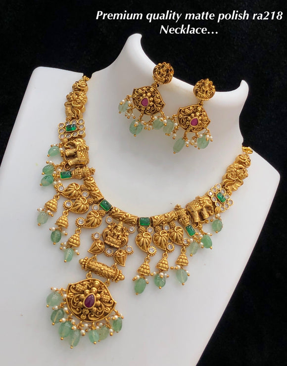 Shubangi , Matte Gold Finish Necklace Set with Green Bead Hangings for women -SHAKI001GSA