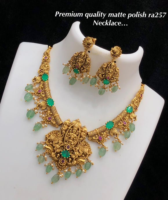 Priyanka , Matte Gold Finish Necklace Set with Green Bead Hangings for women -SHAKI001GS