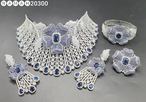 Pallavi ,Platinum Finish Blue stone studded Bridal Heavy Diamond Necklace set with Bracelet and Ring Combo -DWARAKA001BS