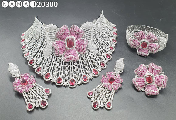 Anandi ,Platinum Finish Pink and Red  stone studded Bridal Heavy Diamond Necklace set with Bracelet and Ring Combo -DWARAKA001PRS