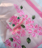 Bougainvillea Beauty ,  Moonga saree beautifully adorned with delicate hand-painted floral motifs in soft pink hues-DIYA001BV