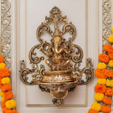 Lord Ganesha in Brass with Intricate carvings and a Oil lamp -HRH001GOL