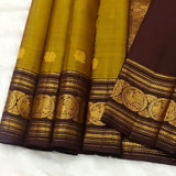 Shobika , Vintage   Kanchipuram traditional Borders with Mayil  Butties Chocolate and Gold Combination Saree  -PDS001KS