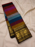 Rainbow Beauty ,  Kanchipuram silk saree with a striking plain black base, elevated by  rainbow weaving body-SACHI001RB