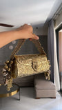 Sitara , Exclusive Hand carved Premium Designer  German Silver Gold Plated Clutch Bag for women -AKSH001GCA