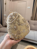 Shabana , Beautiful Nude Gold and Ivory Sequins embellished Bridal Oval Clutch for Women -AKSH001BCA