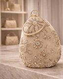 Shabana , Beautiful Nude Gold and Ivory Sequins embellished Bridal Oval Clutch for Women -AKSH001BCA