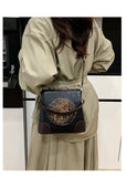 Black Premium Classy Leather Look Elephant Design  Broad Belt Sling Bag for women -GUP001TBL
