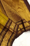 Shobika , Vintage   Kanchipuram traditional Borders with Mayil  Butties Chocolate and Gold Combination Saree  -PDS001KS