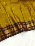 Shobika , Vintage   Kanchipuram traditional Borders with Mayil  Butties Chocolate and Gold Combination Saree  -PDS001KS