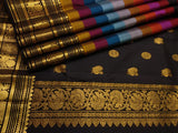 Rainbow Beauty ,  Kanchipuram silk saree with a striking plain black base, elevated by  rainbow weaving body-SACHI001RB
