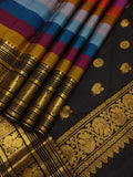Rainbow Beauty ,  Kanchipuram silk saree with a striking plain black base, elevated by  rainbow weaving body-SACHI001RB