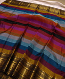 Rainbow Beauty ,  Kanchipuram silk saree with a striking plain black base, elevated by  rainbow weaving body-SACHI001RB