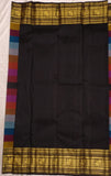 Rainbow Beauty ,  Kanchipuram silk saree with a striking plain black base, elevated by  rainbow weaving body-SACHI001RB