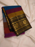 Rainbow Beauty ,  Kanchipuram silk saree with a striking plain black base, elevated by  rainbow weaving body-SACHI001RB