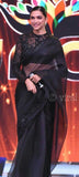 Deepika in ravishing black shimmering oraganza saree
