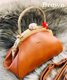 Women's Gold frame Handbags with solid gold handle