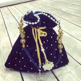 Bridal Velvet Embroidered Potli bags with pearl embellishments and Golden tassels