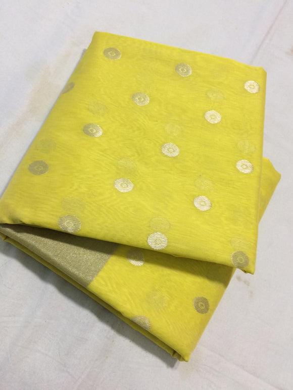 Authentic Chanderi Silk Cotton Saree in Yellow with Golden Zari and gold butties all over the saree.