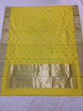 Authentic Chanderi Silk Cotton Saree in Yellow with Golden Zari and gold butties all over the saree.