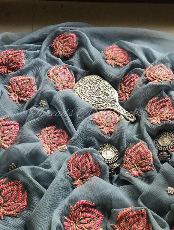 Grey Pure Diamond Chiffon Saree With Red motifs in  Resham Work.