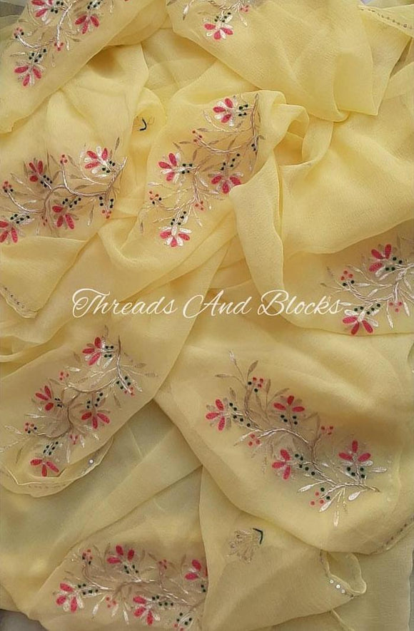 Yellow Pure Diamond Chiffon Saree With flower embroidery and Resham Work.