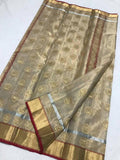 Golden Chanderi Silk Cotton Saree with Mudra motifs.
