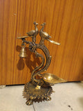 PREM MAYURI, ANTIQUE FINISH BRASS DOUBLE PEACOCK  DEEPAM /LAMP WITH A  SINGLE LARGE  DIYA-HDSGWBD002