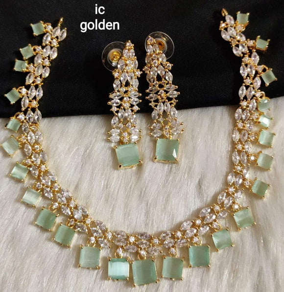 GREEN SPARKLES, PATEL GREEN STONE GOLD FINISH NECKLACE SET FOR WOMEN -RIGNSW001PG