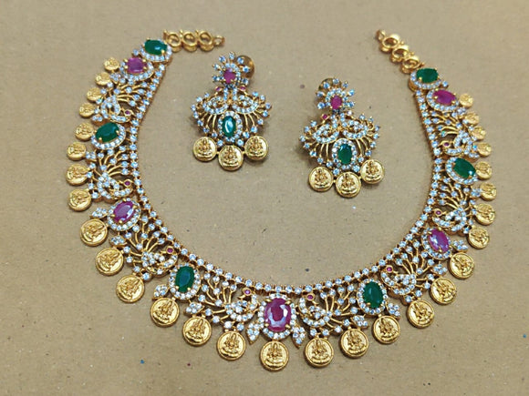 MADHAVI, STONE STUDDED MATTE GOLD FINISH NECKLACE SET FOR WOMEN -ARTMNS001