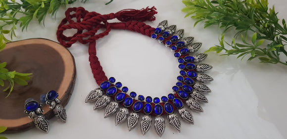 KOLHAPURI GERMAN SILVER DESIGNER NECKLACE WITH DEEP BLUE  STONES AND MAROON THREAD -LORD001DBM
