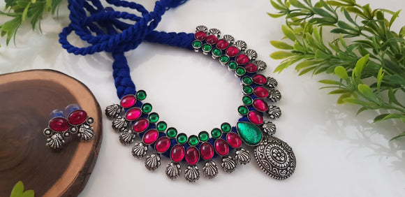 PINK LADY, KOLHAPURI GERMAN SILVER DESIGNER NECKLACE WITH PINK STONES AND BLUE THREAD -LORD001PI