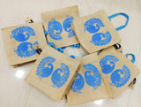 Set of 10 , Natural laminated Jute bag with contrast peacock print on it-MK001JB