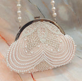 SHAYNA, DESIGNER PEARL STUDDED CLUTCH WITH PEARL HANDLE FOR WOMEN -SKD001PC