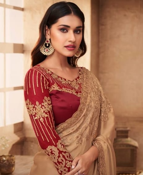 maroon saree golden blouse