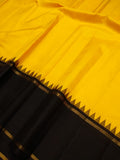 KAVYAKALA, TRADITIONAL YELLOW AND BLACK KANJIVARAM KORVAI TEMPLE BORDER WITH RETTAI BORDER SILK SAREE -PDS001YB