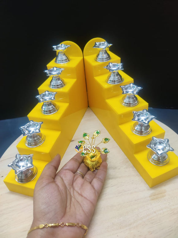 ANU PALLAVI , YELLOW ACRYLIC STEPS WITH  10 GERMAN SILVER DIYAS AND TULSI TREE -CRZ001YPA