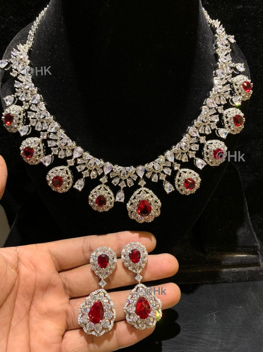 Whitestone Set Maroon Gana, elegant White stone Necklace set With Maroon middle stone ...