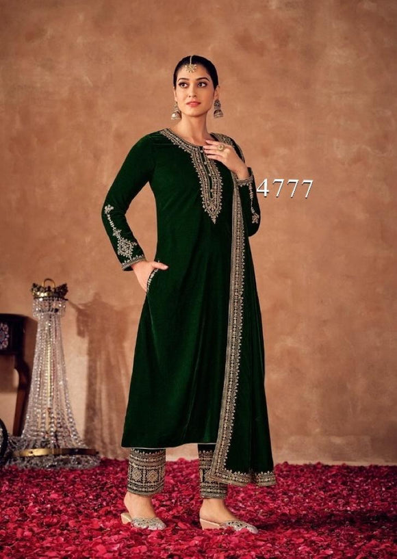 green velvet pakistani dress Buy Embroidered Velvet Pakistani Suit in Dark Green Online : KVG437