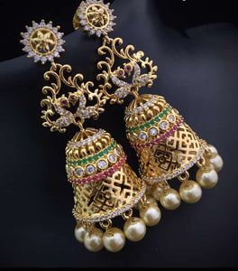 Beautiful Designer gold Jumka with intricate gold work and pearls