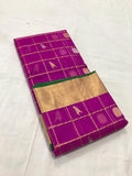 Purple and green katan silk saree