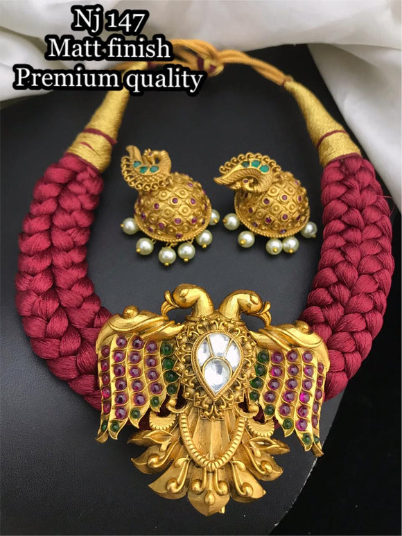 MEROON  GARUDA PENDANT NECKLACE WITH BRAIDED THREAD NECKLACE SET FOR WOMEN