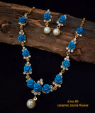 GOLDEN FINISH CERAMIC STONE FLOWER NECKLACE SET FOR WOMEN CSNSDNO80