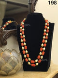 TRENDY CORAL WITH PEARL DROPLETS  STATEMENT NECKLACE FOR WOMEN RGN198