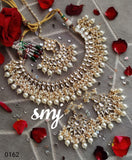 Lovely pearl charms uncut dabi kundan stones Necklace with earrings and Maangtika-ETN21