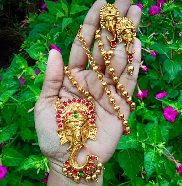 Gold beads chain with ganpathy pendant and matching earrings
